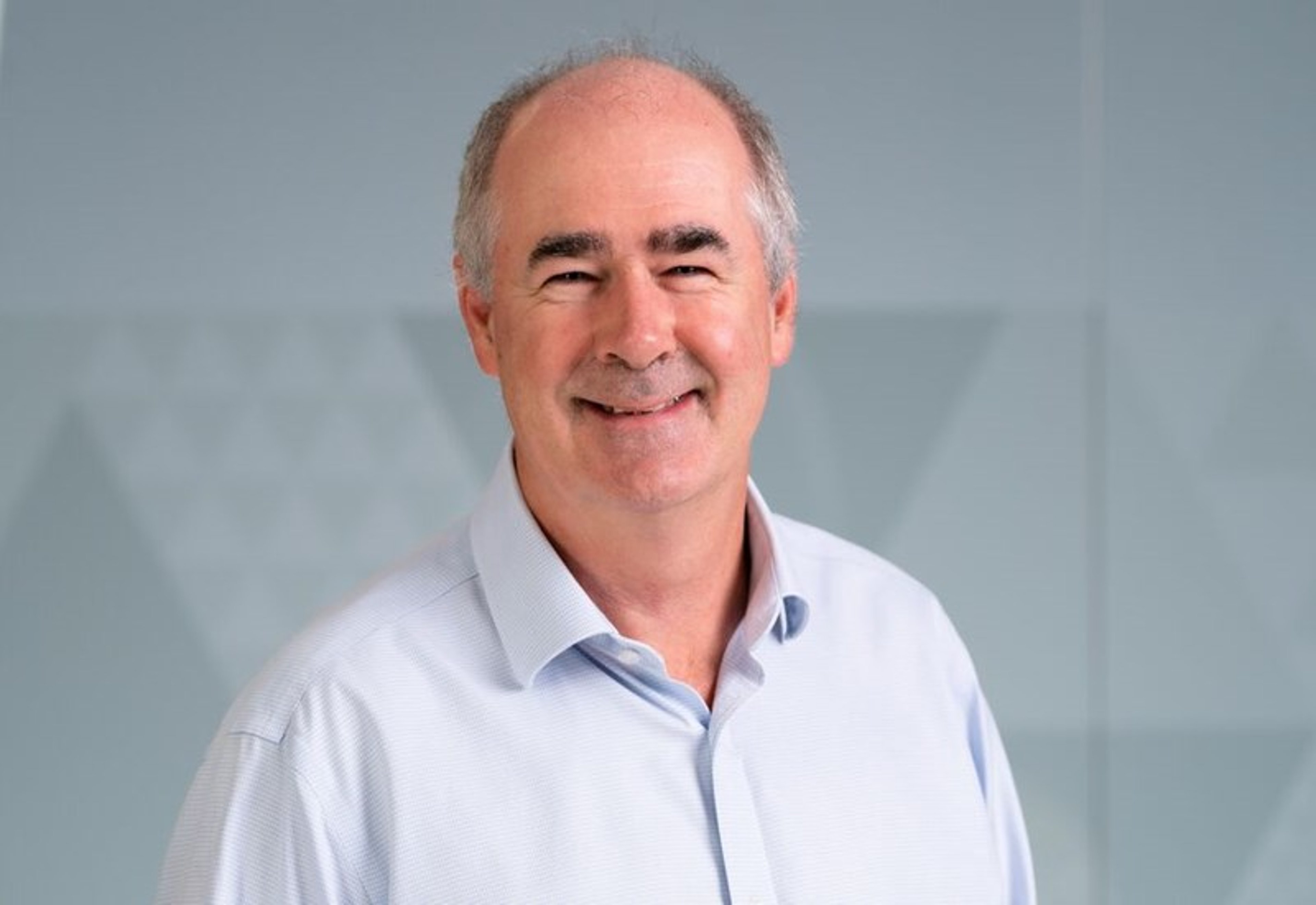 A headshot of Neil Morrison