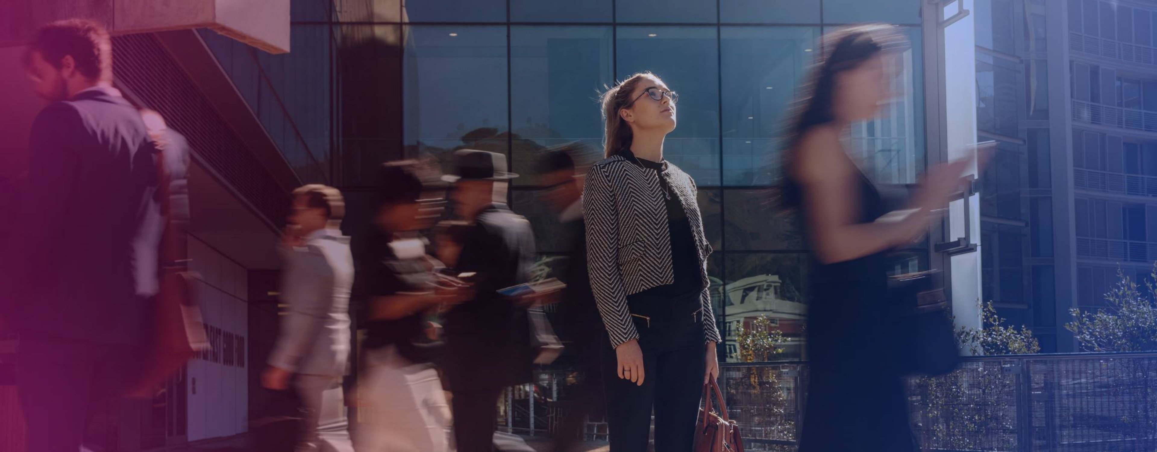 Woman standing in a crowd